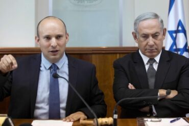 Leader of Bayit Yehudi party Naftali Bennet with Israeli PM Netanyahu