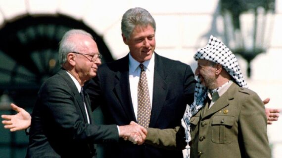 Bill Clinton, Yitzhak Rabin, and Yasser Arafat after the signing of the Oslo Accords