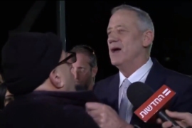 Benny Gantz putting hands on Elie Yosef