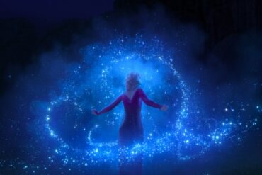 Frozen 2 Elsa surrounding by sparkling ice
