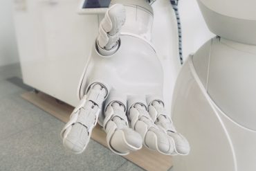 Robot hand reaching out "Oxford and High Tech" by Esther Cameron