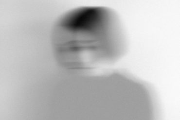 Blurred grayscale photo of a woman - the day after Yom Kippur