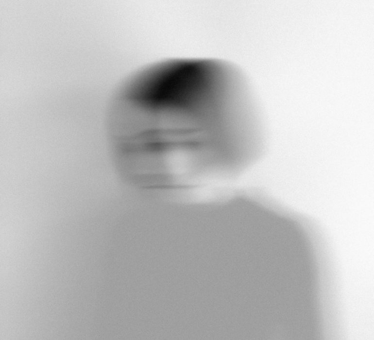 Blurred grayscale photo of a woman - the day after Yom Kippur